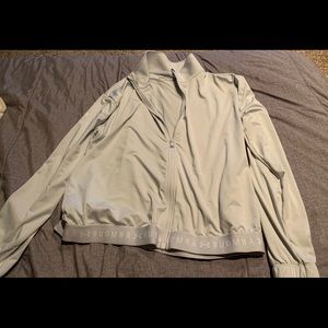 Women’s medium under armour heat gear zip up gray